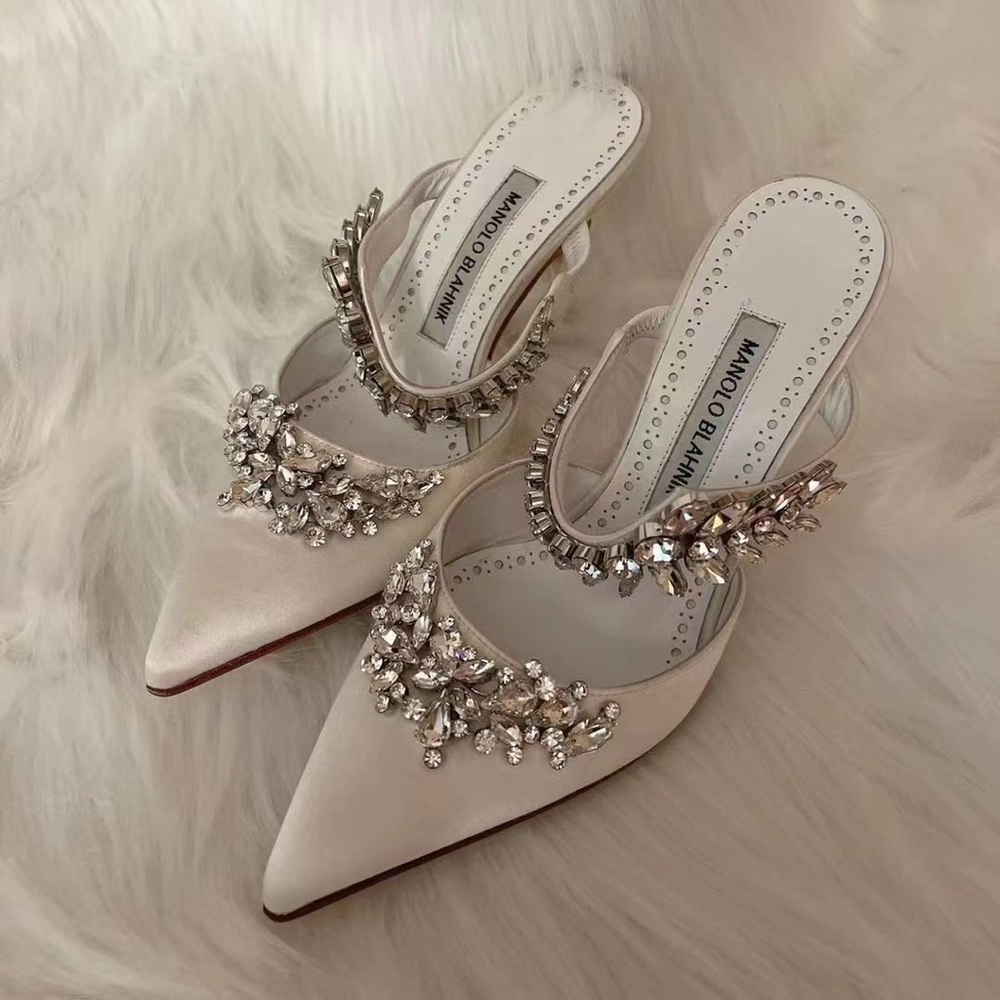 New But No Tag.  Manolo blahnik lurum embellished mules in size 36